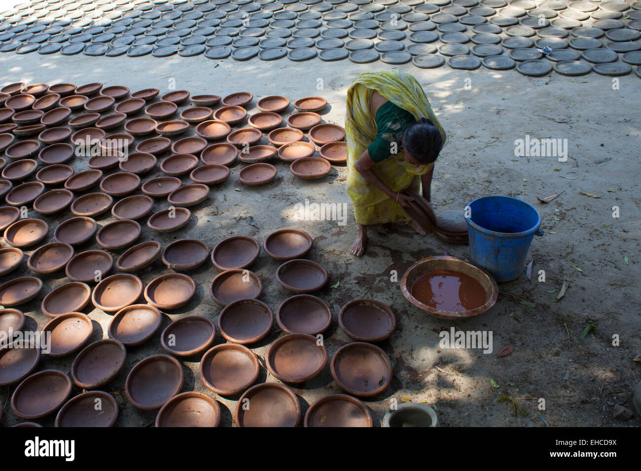 Dhaka Bangladesh 11th March 2015 Potter making pots using clay near