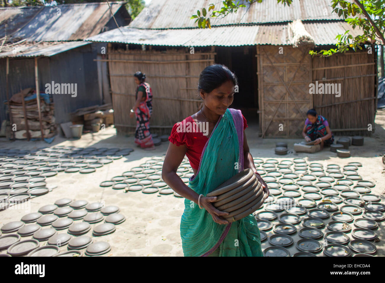 Dhaka Bangladesh 11th March 2015 Potter making pots using clay near