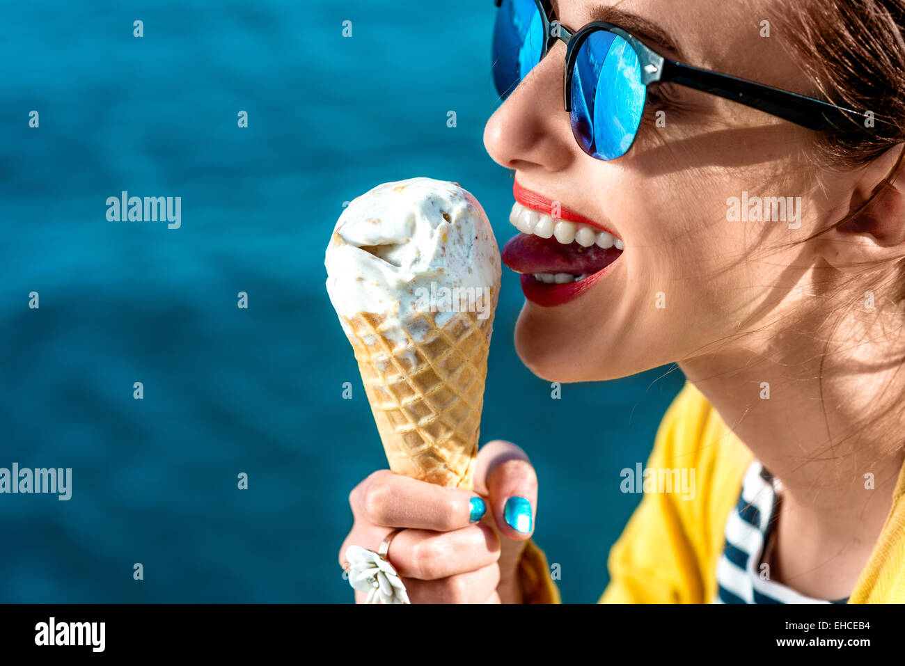 Woman with ice cream Stock Photo Alamy
