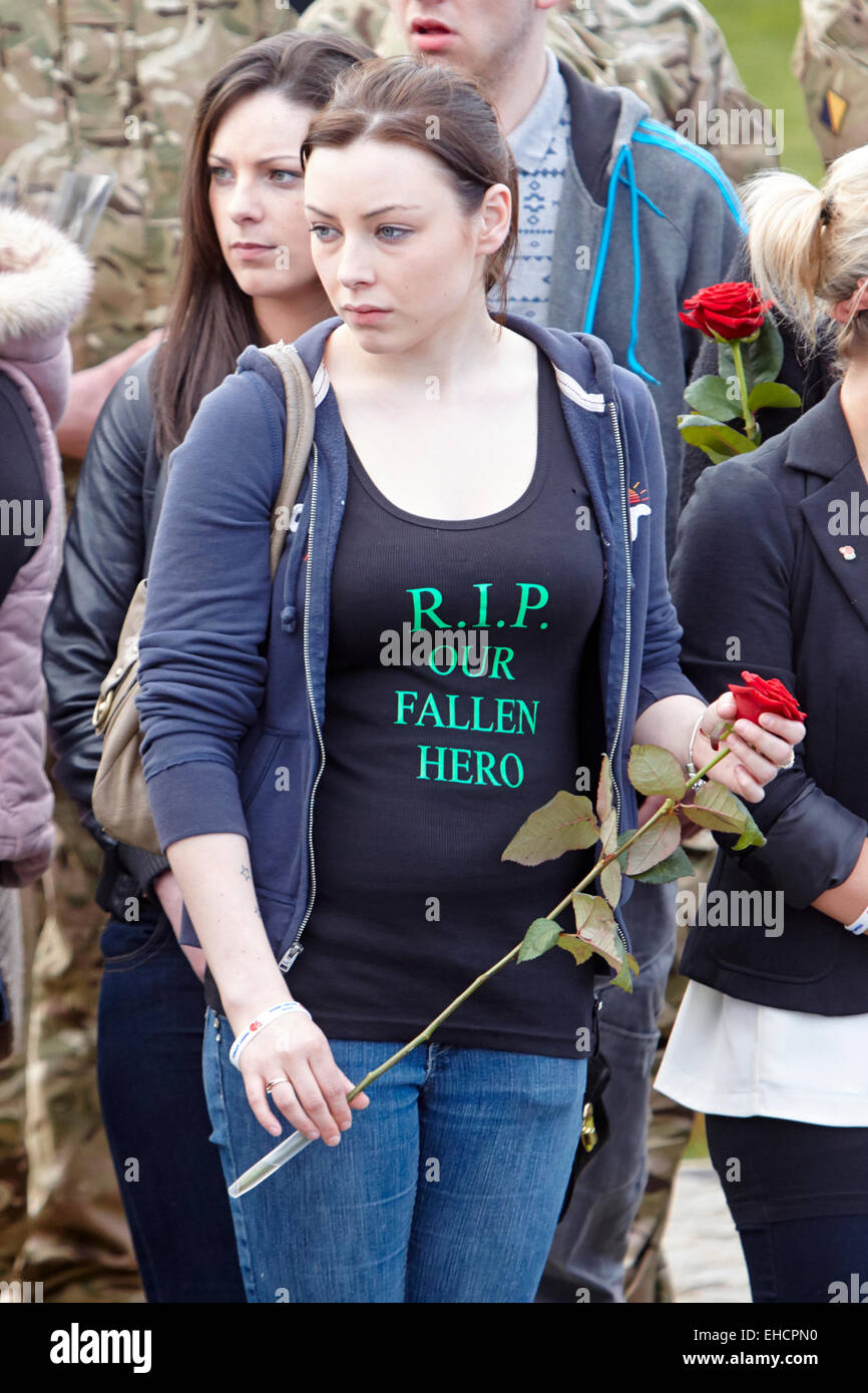 Friends and family of six soldiers killed when an IED destroyed their vehicle take part in a repatriation ceremony Stock Photo