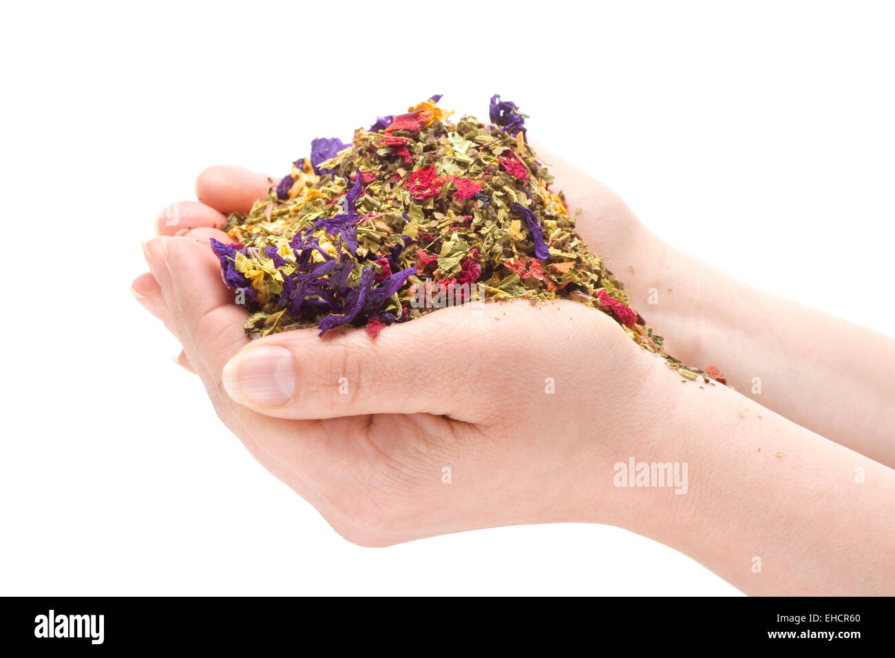 Closeup of Female Hands Holding a Pile of Herbs Stock Photo
