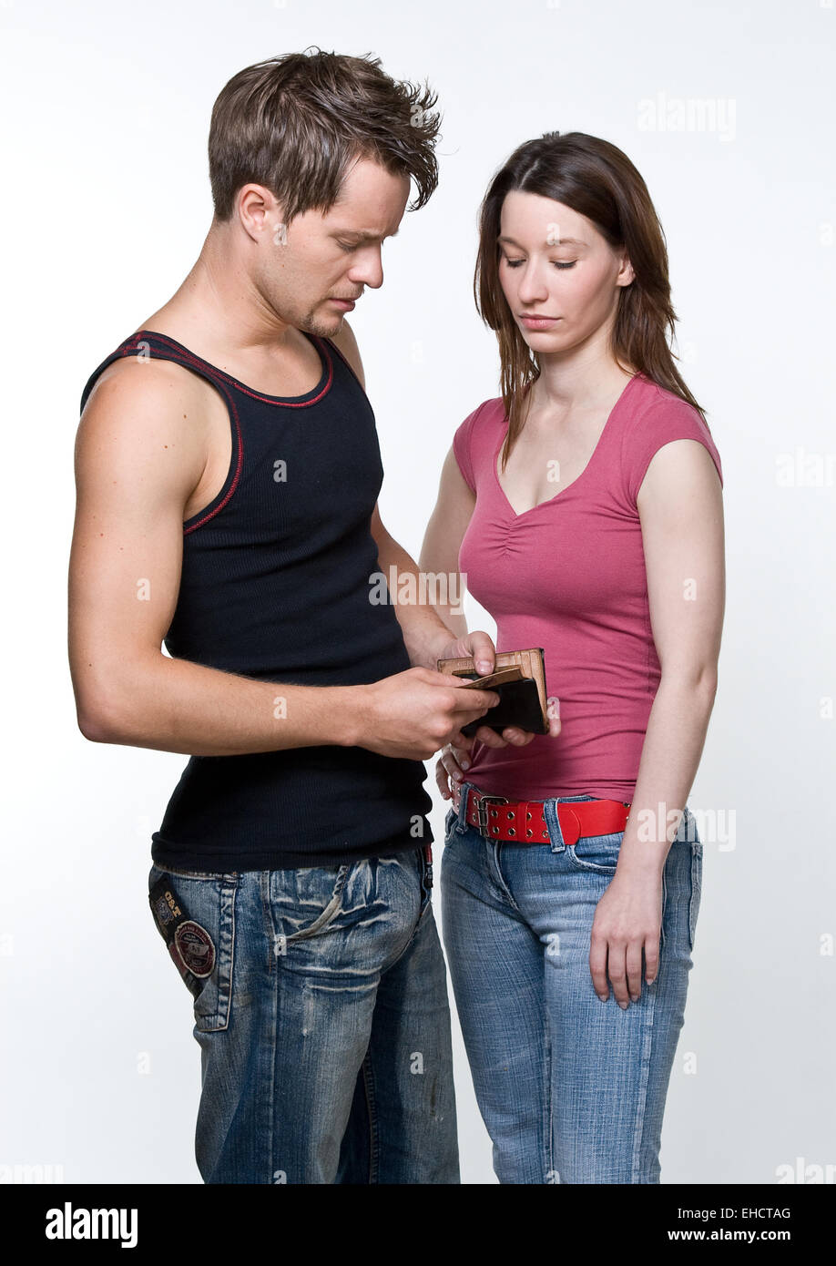 Couple with wallet Stock Photo - Alamy