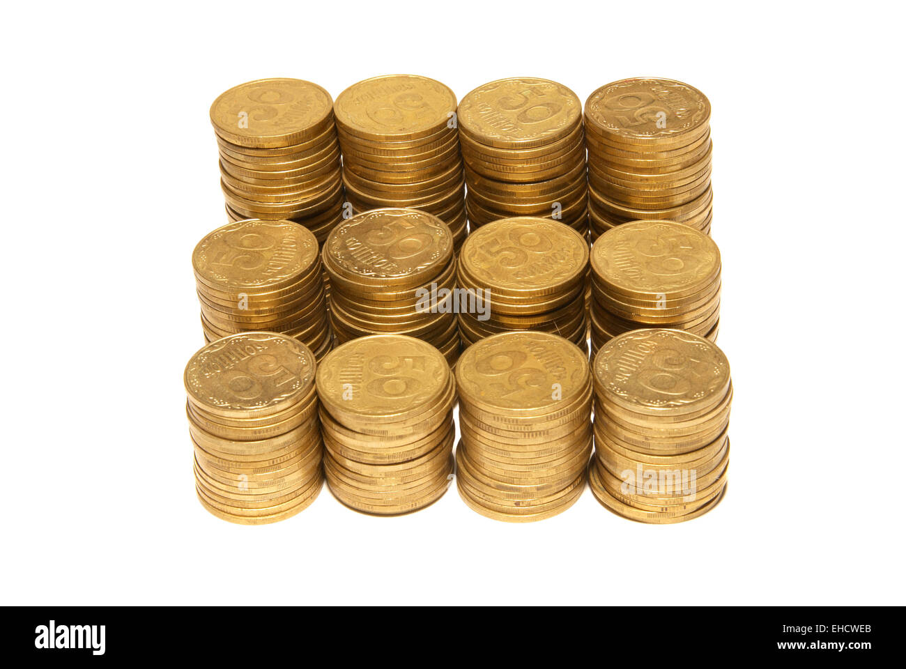 Stack of golden coins isolated on white Stock Photo - Alamy