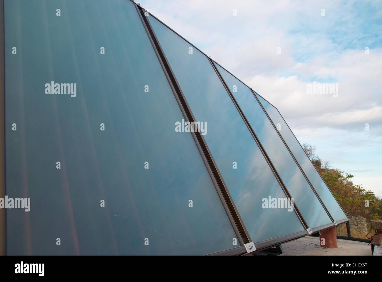 Solar water heating system on the house roof Stock Photo - Alamy