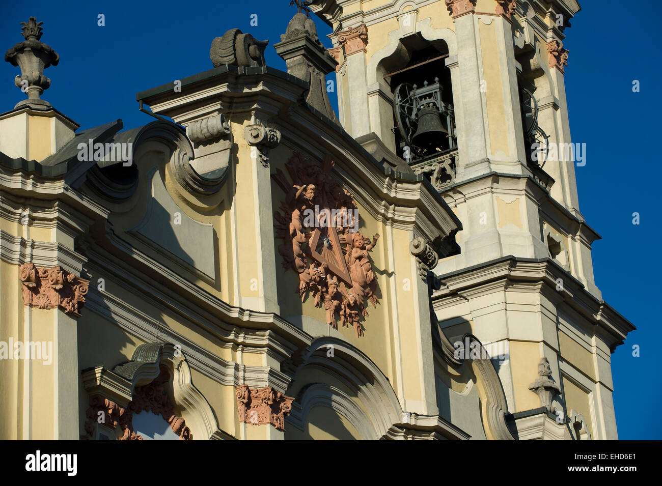 Italy, Crema, the Holy Trinity church, street XX Settembre in Baroque style, the bell tower of the Redeemer statue. Stock Photo
