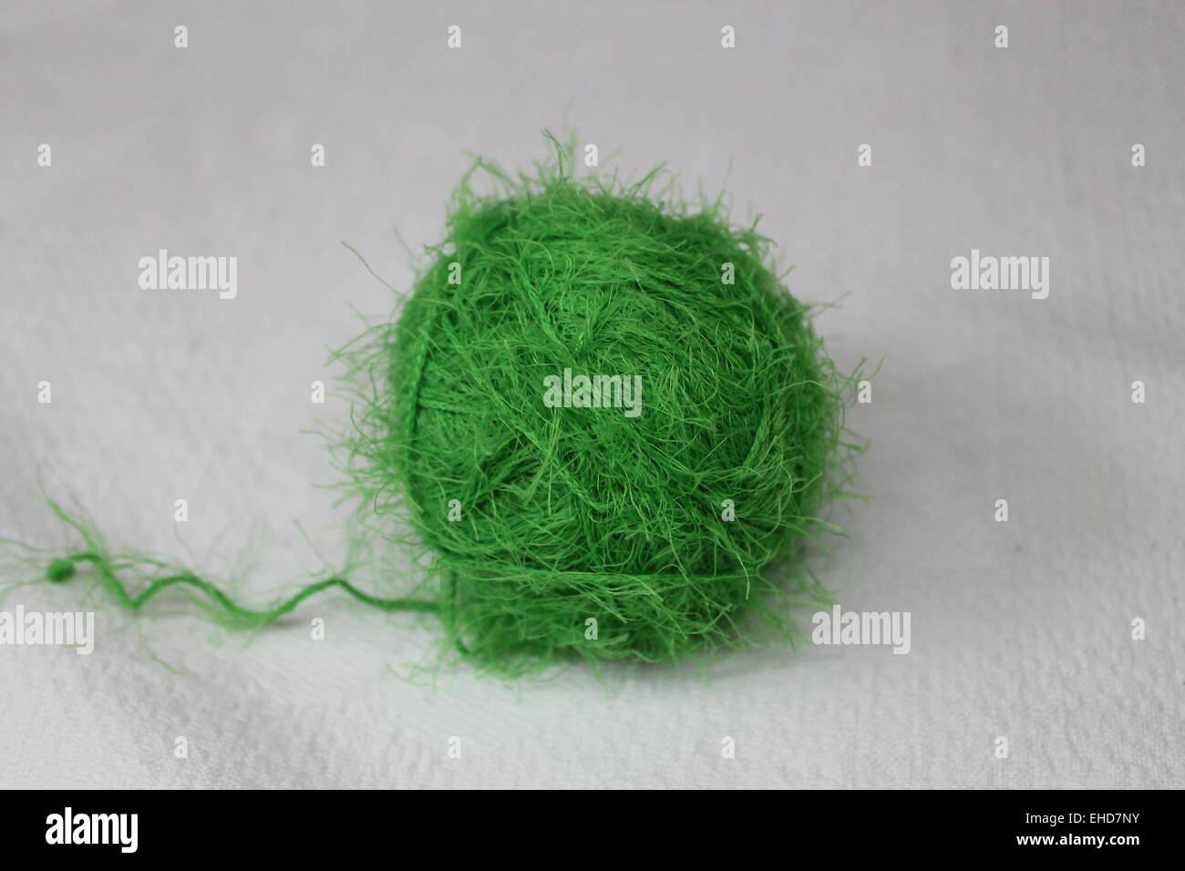 green beautiful soft ball from fluffy threads Stock Photo