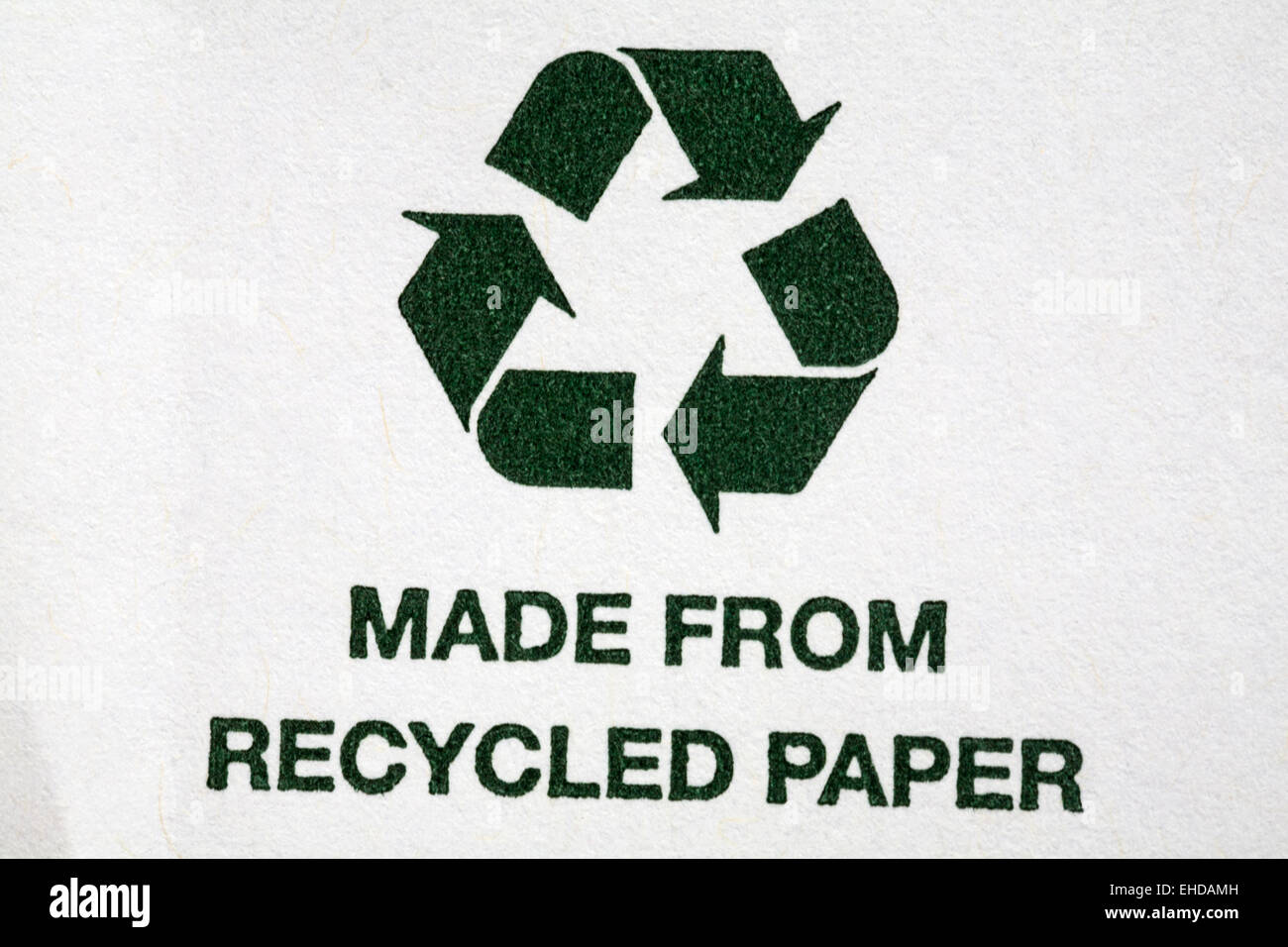 Made from recycled paper and recycle logo on white envelope Stock Photo