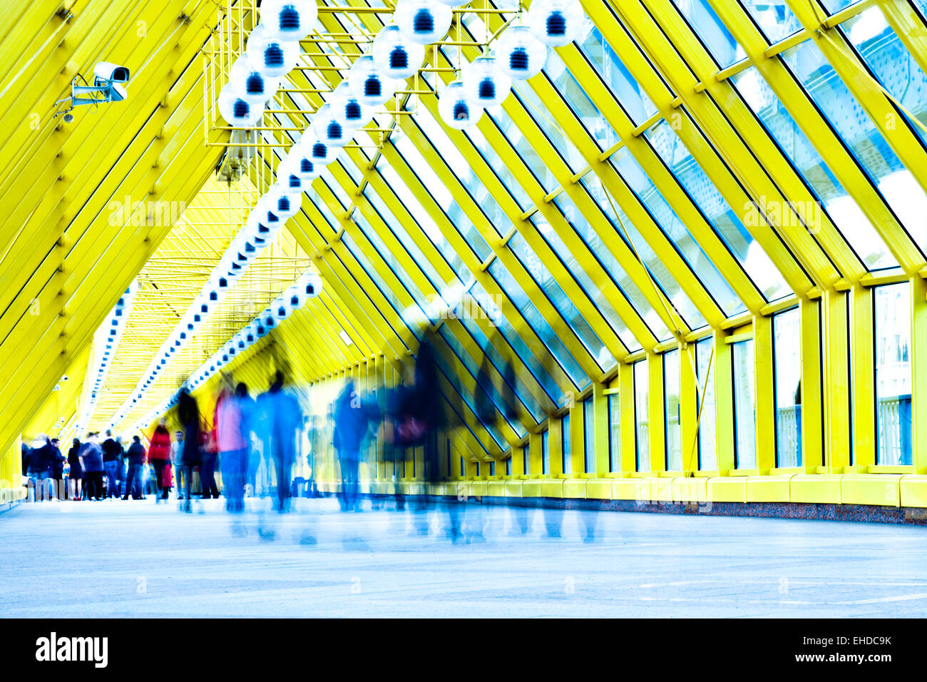 Crowd In Motion In Corridor Crowd In Motion In Yellow Corridor Stock Photo 79585679