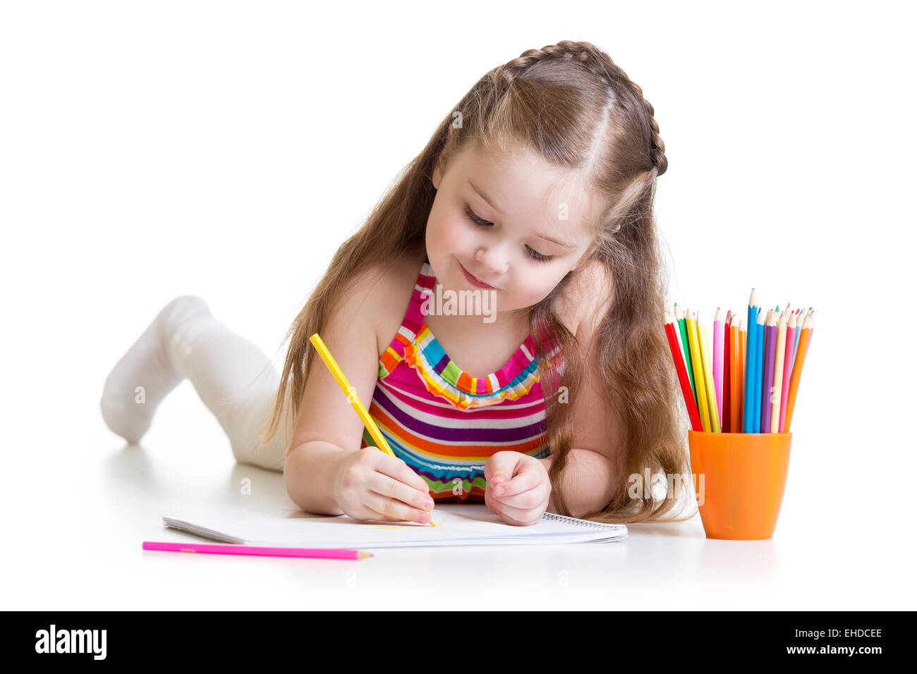 Cute happy little girl drawing hires stock photography and images Alamy