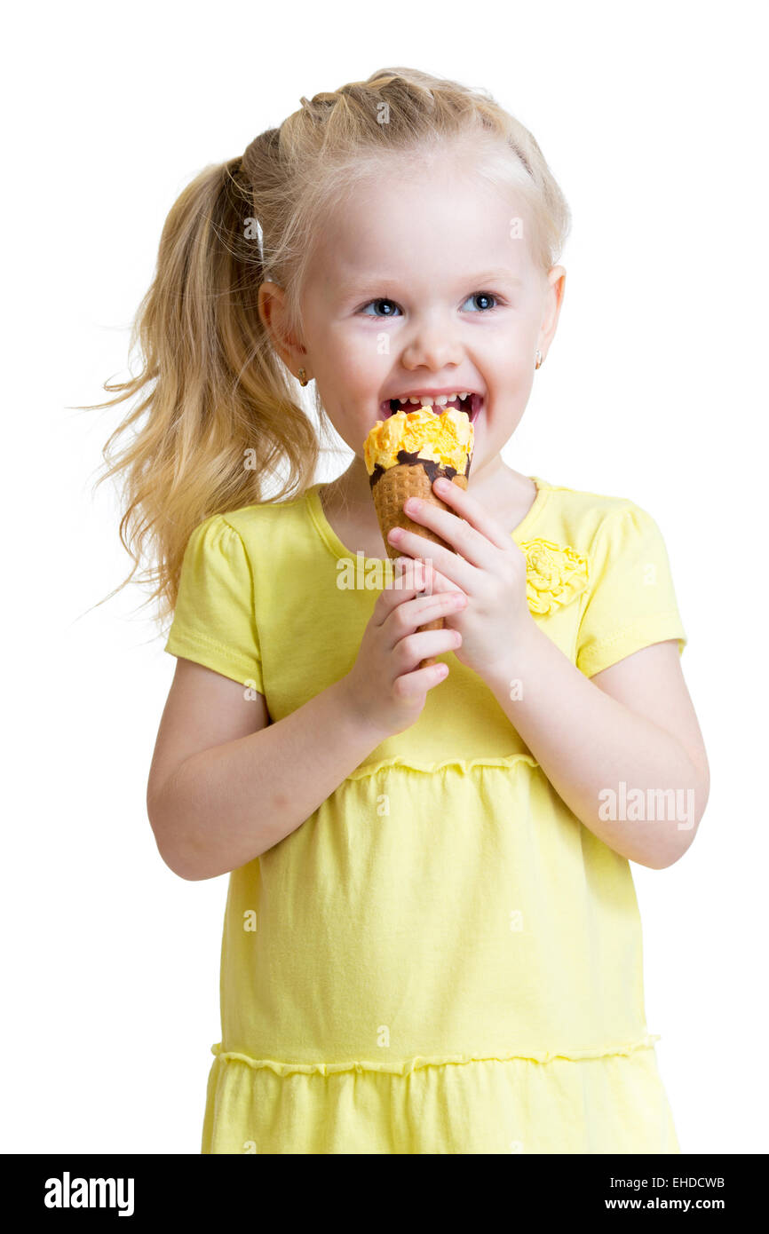 happy kid eating ice cream in studio isolated Stock Photo