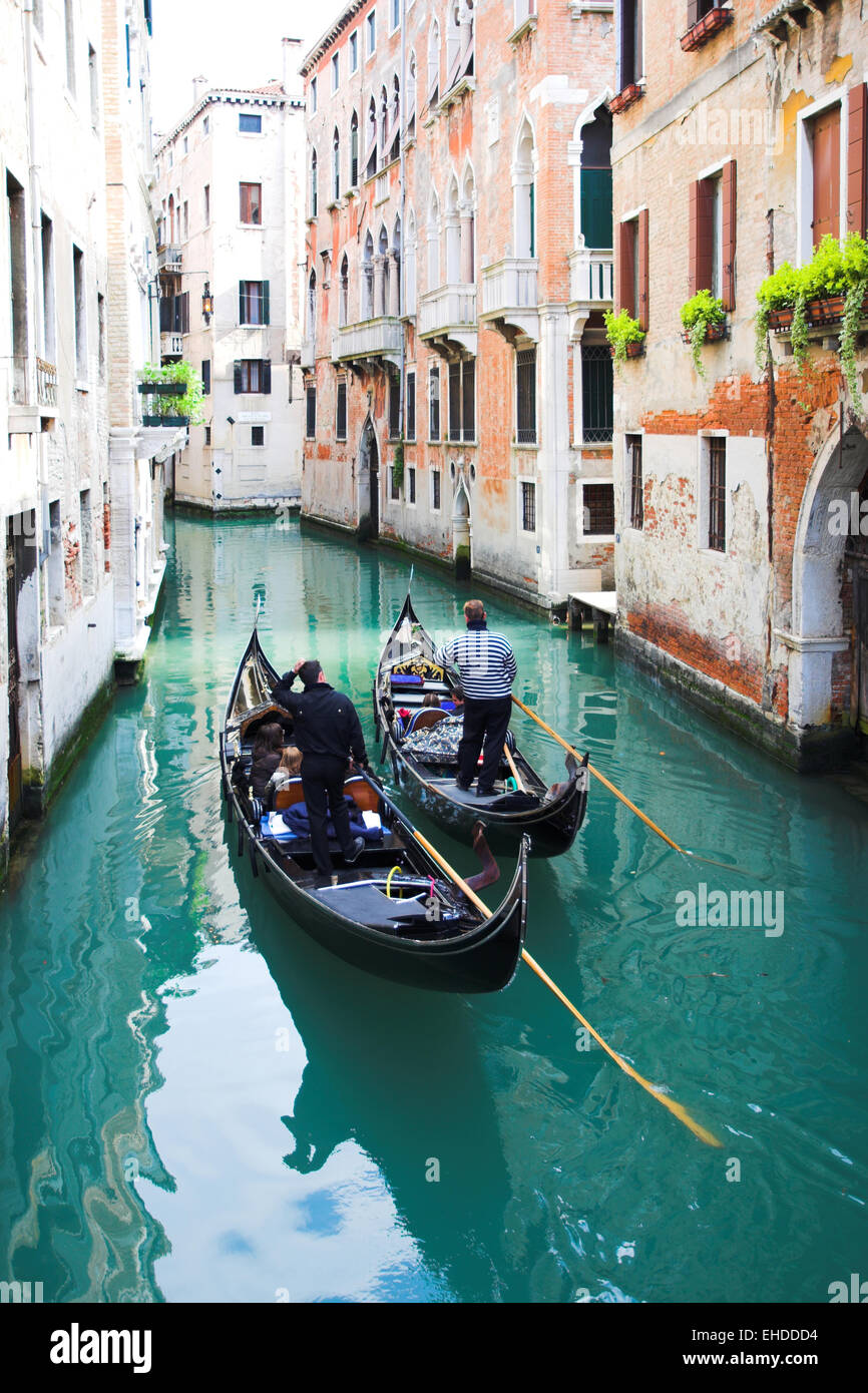 Gondoliers on water Stock Photo