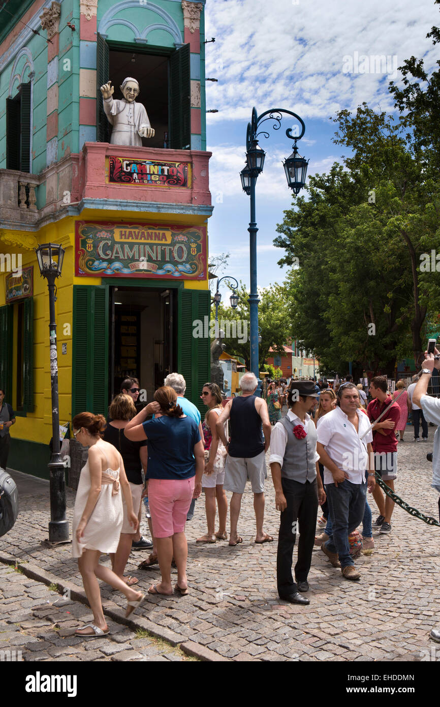 Argentina, Buenos Aires, La Boca, Magallenes, tourists outside Havanna Camonita bar with pope figure  in upstairs balcony Stock Photo