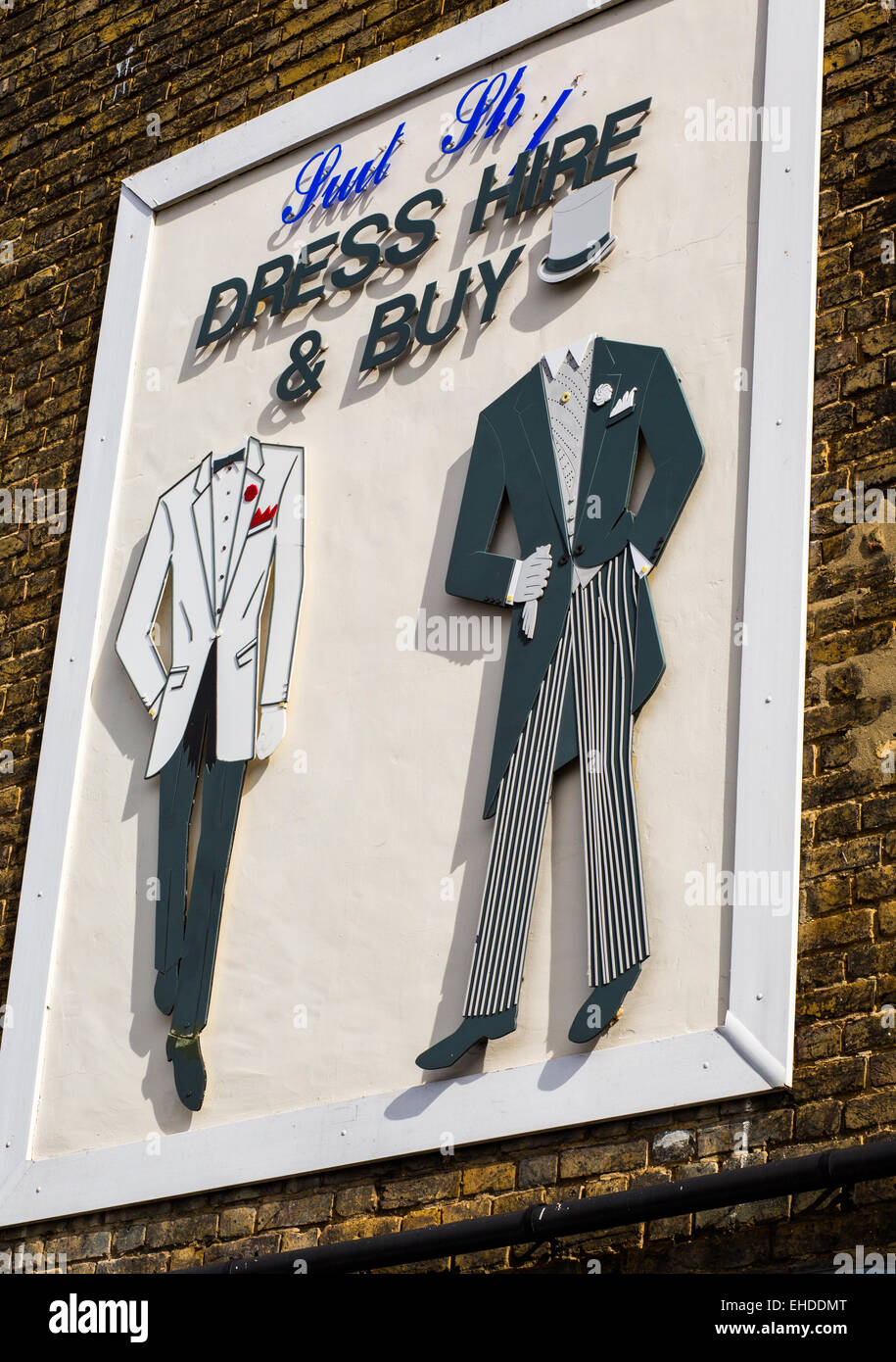 suit hire shop sign on side of store, SOUTHENDONSEA Stock Photo Alamy