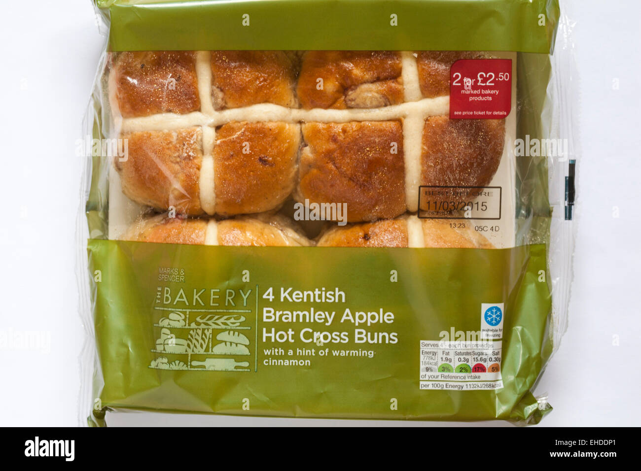 packet of Marks & Spencer 4 Kentish Bramley Apple Hot Cross Buns with a