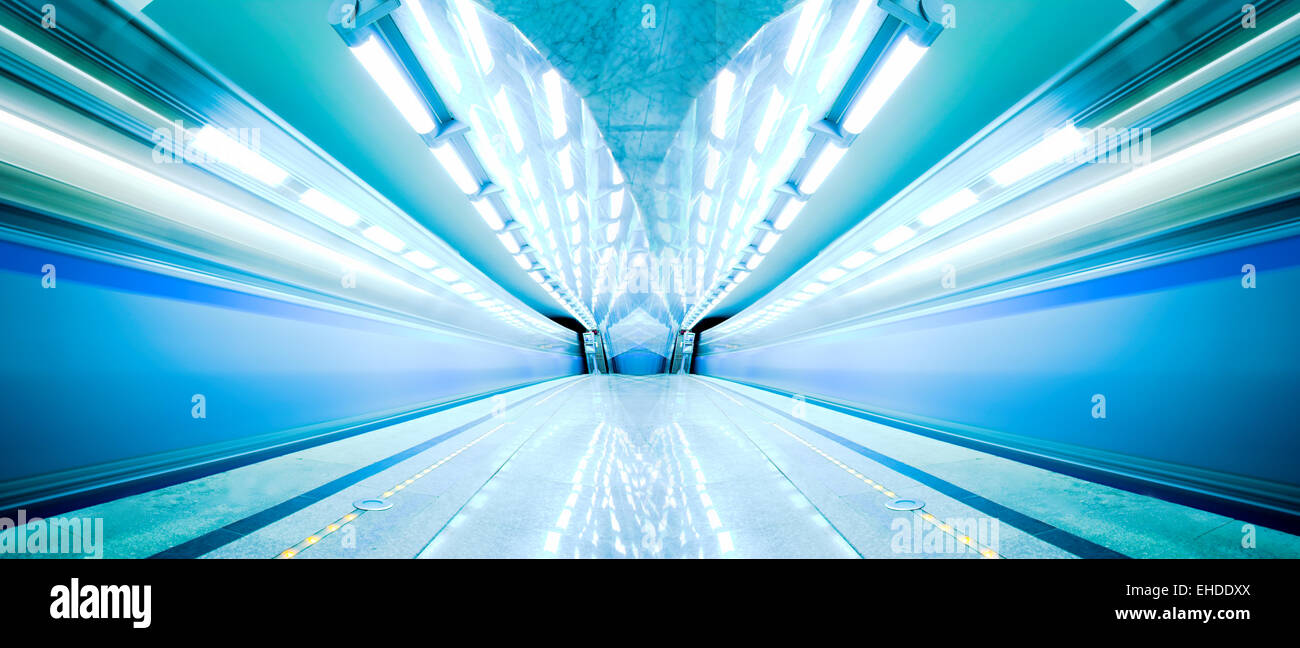Blue fast train stay at hall platform Stock Photo - Alamy