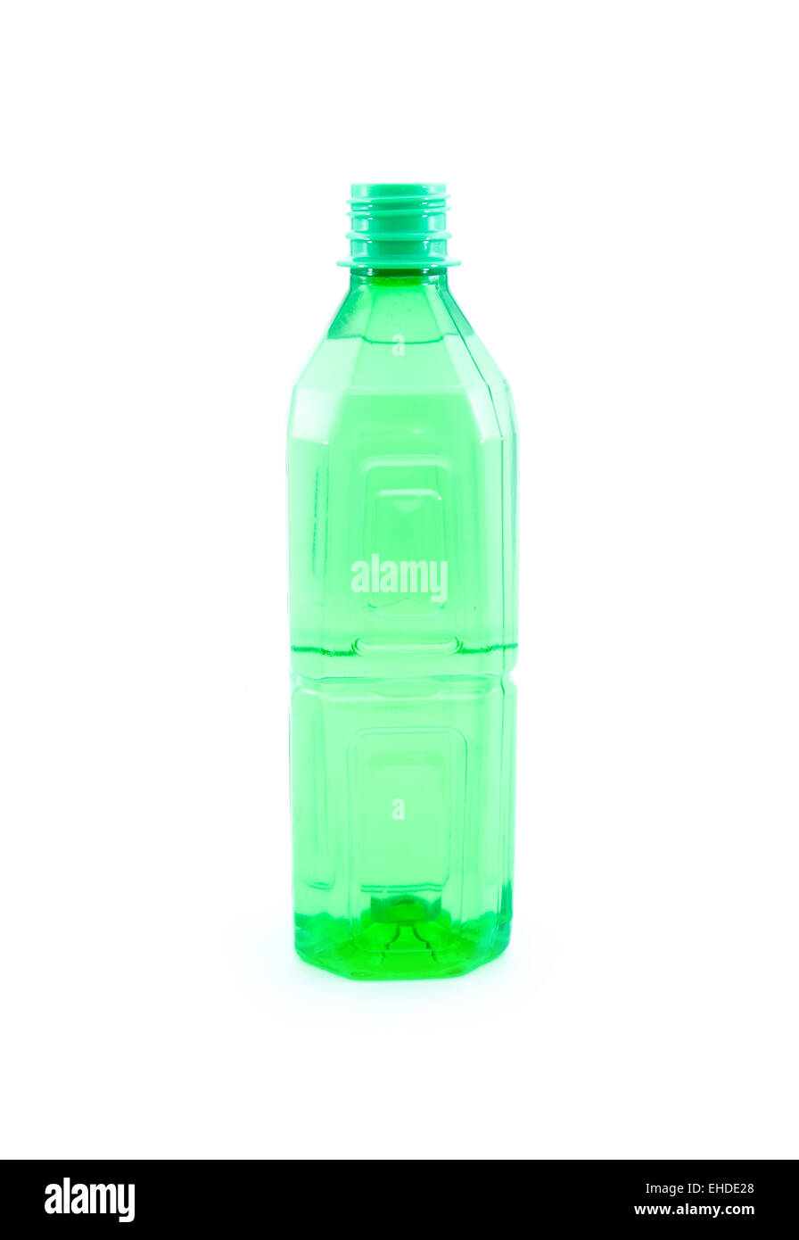 green transparent bottle isolated on white background Stock Photo - Alamy