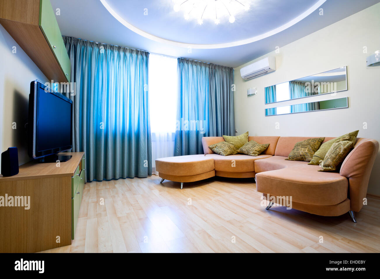 Modern room interior with TV and sofa Stock Photo Alamy