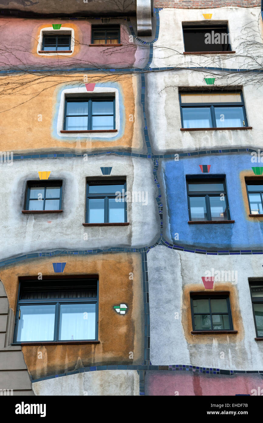 Hundertwasser House in Vienna, Austria. A building with variety of windows and colorful painting. Stock Photo