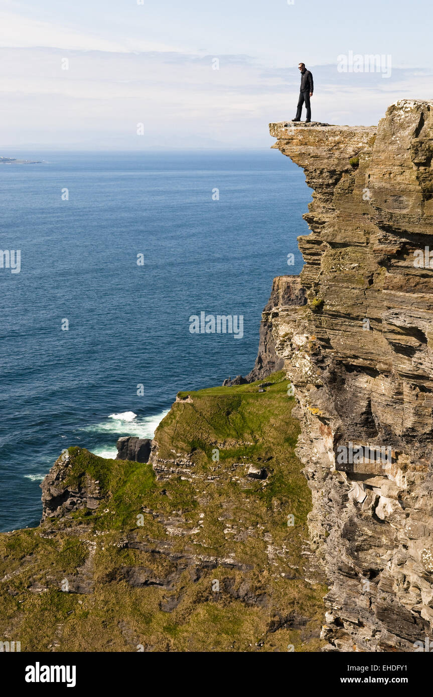 Man on a cliff Stock Photo