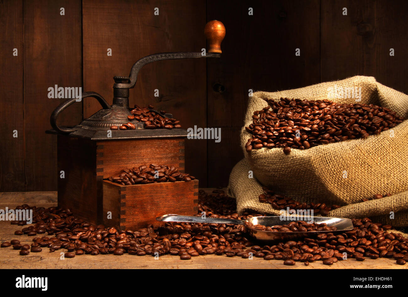 Antique coffee grinder with beans Stock Photo Alamy