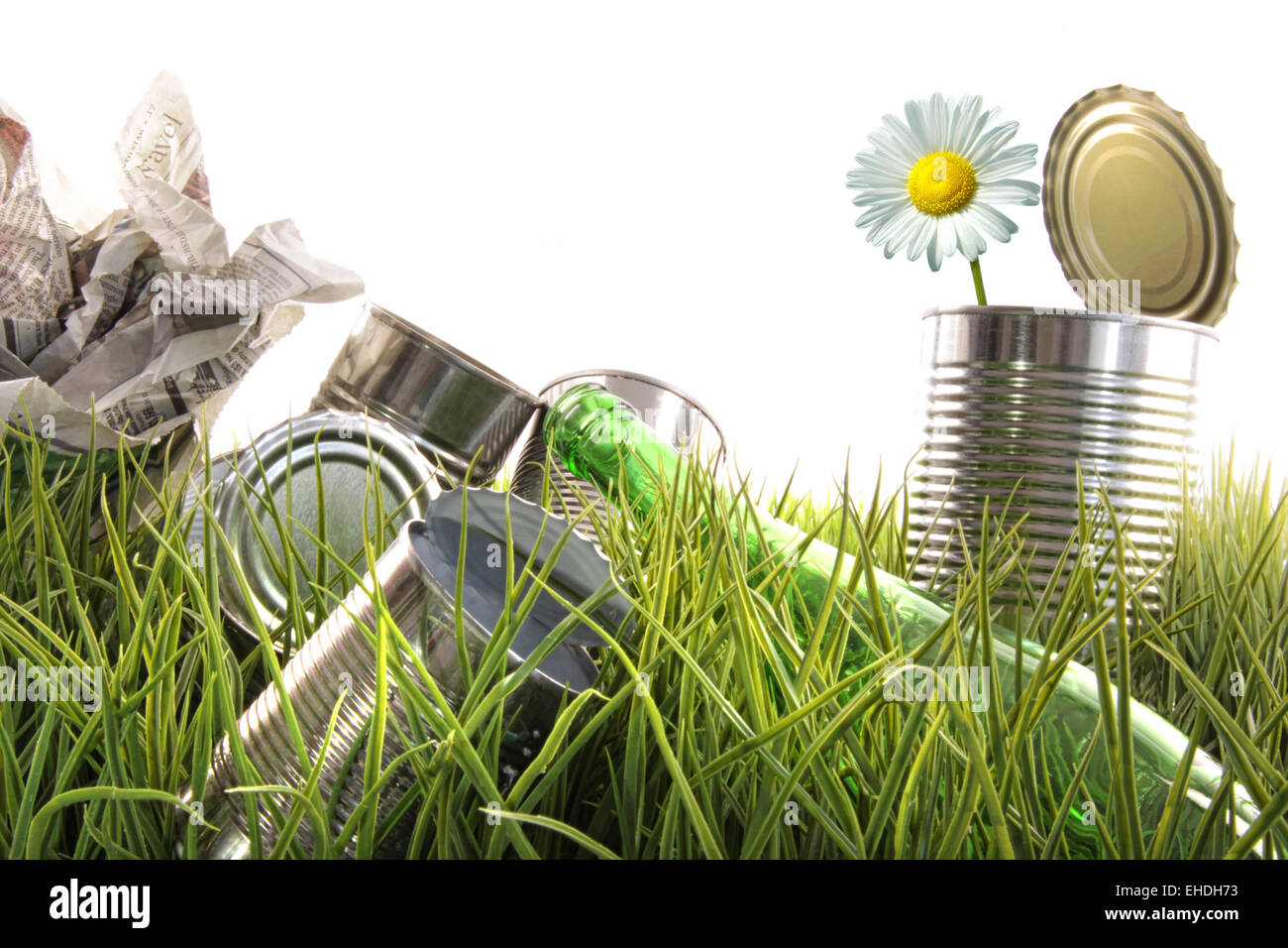 Trash, empty cans and bottles in grass Stock Photo Alamy