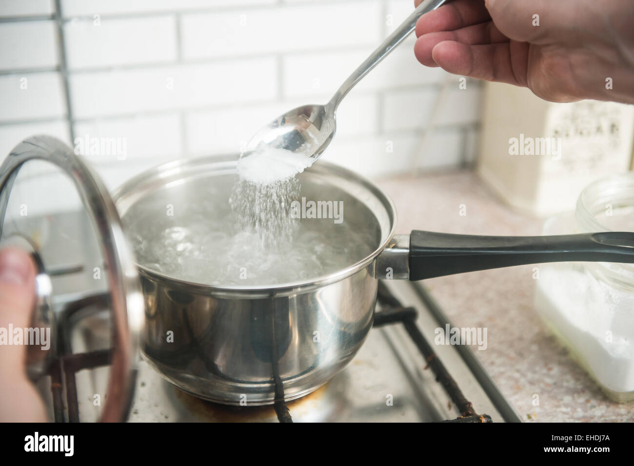 Pot Boiling Water Electric Stove Kitchen Space Text Stock Photo by  ©NewAfrica 240604464