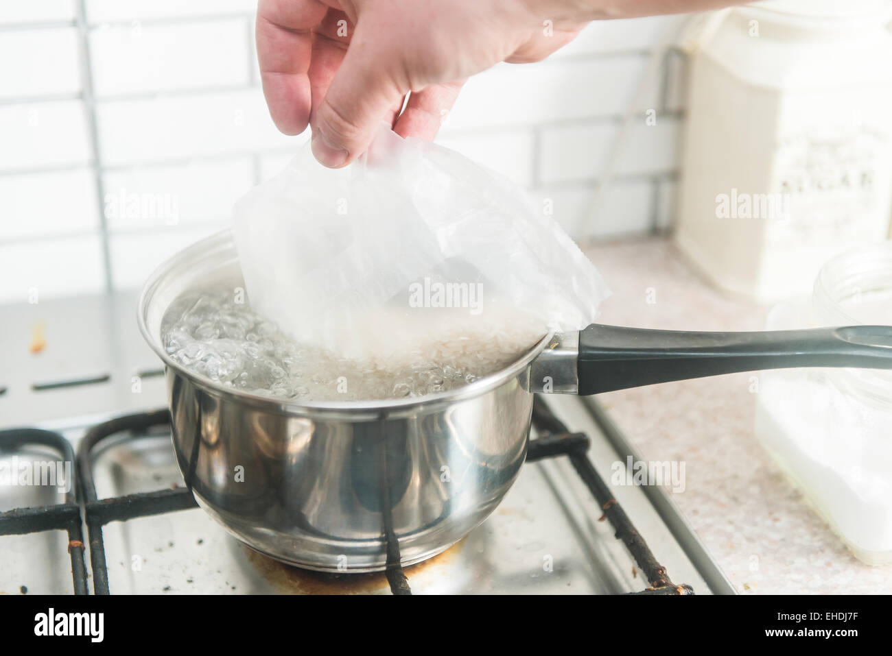 rice and boiling water,chef cooking dinner Stock Photo