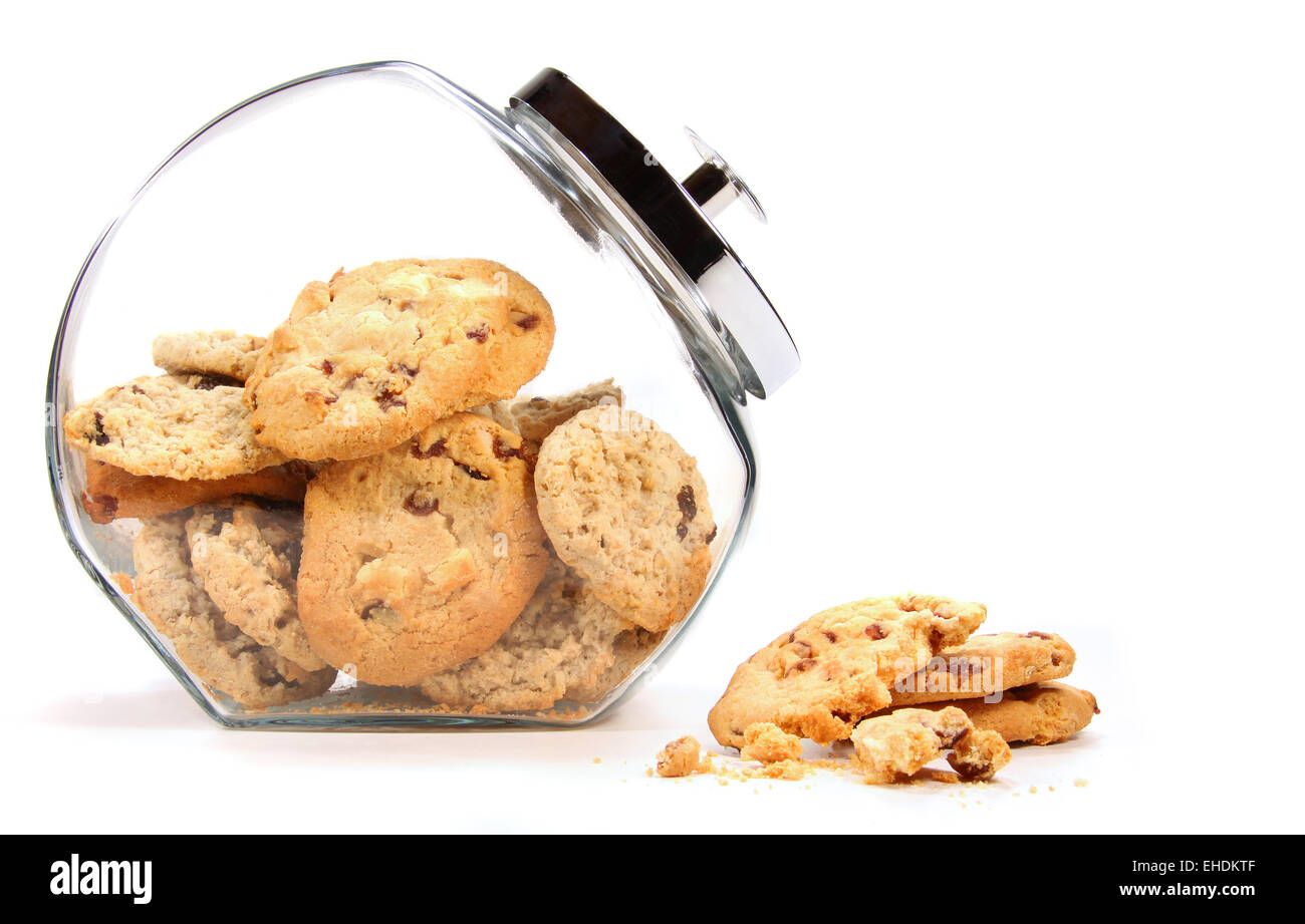 Glass  jar with cookies against a white Stock Photo
