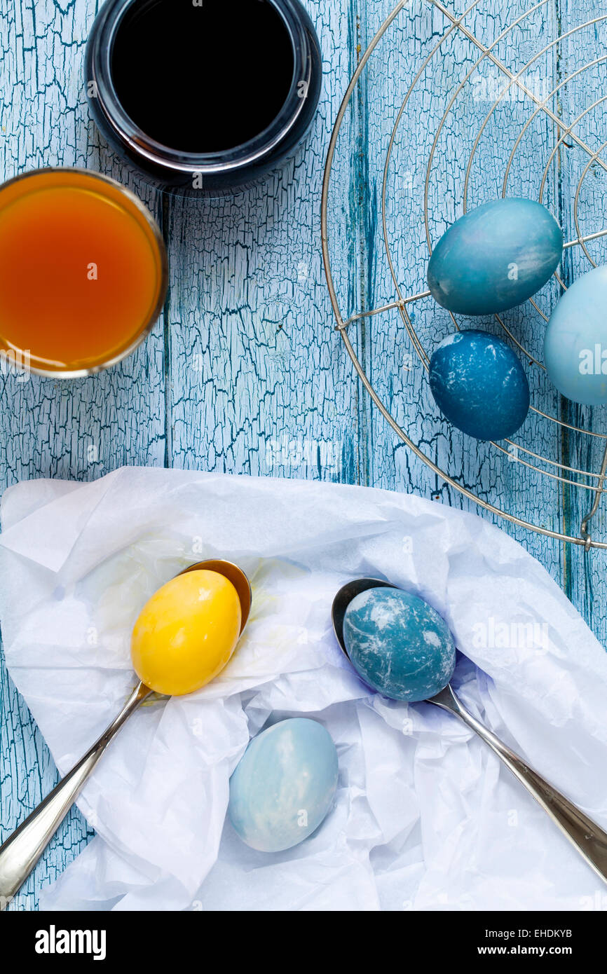 Easter eggs painted with natural dye red cabbage and tumeric Stock