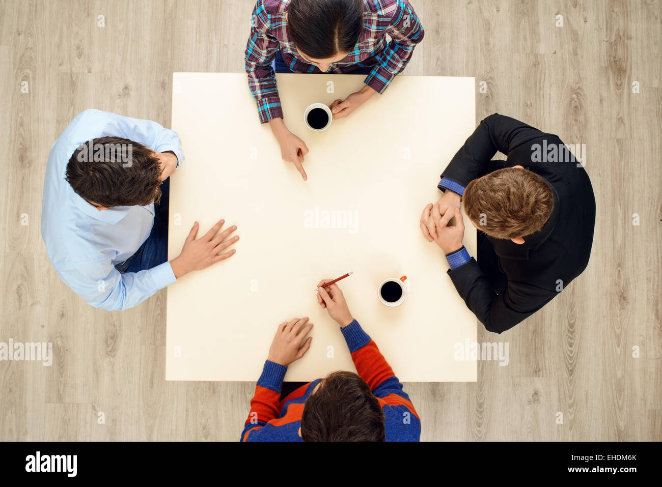 Top view table with group of young people Stock Photo - Alamy