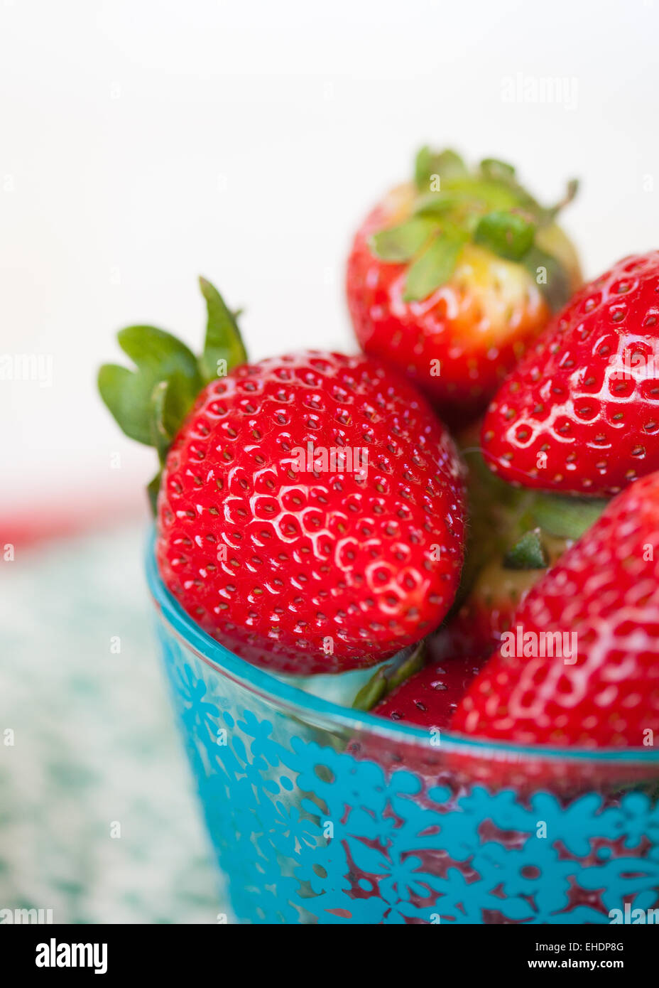 Close up of fresh strawberries in a bowl Stock Photo