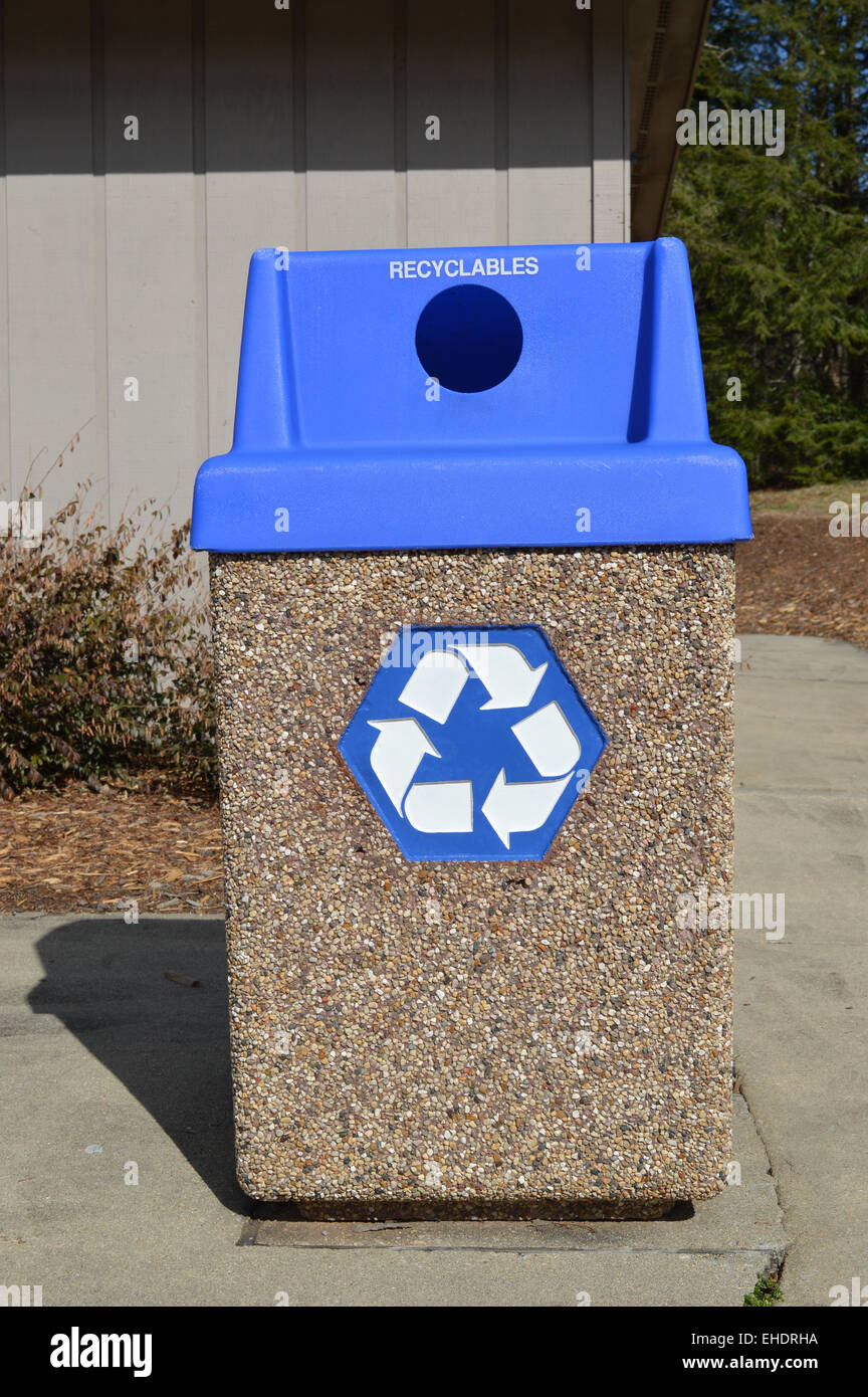 Recycling containers located in a Center Stock Photo Alamy
