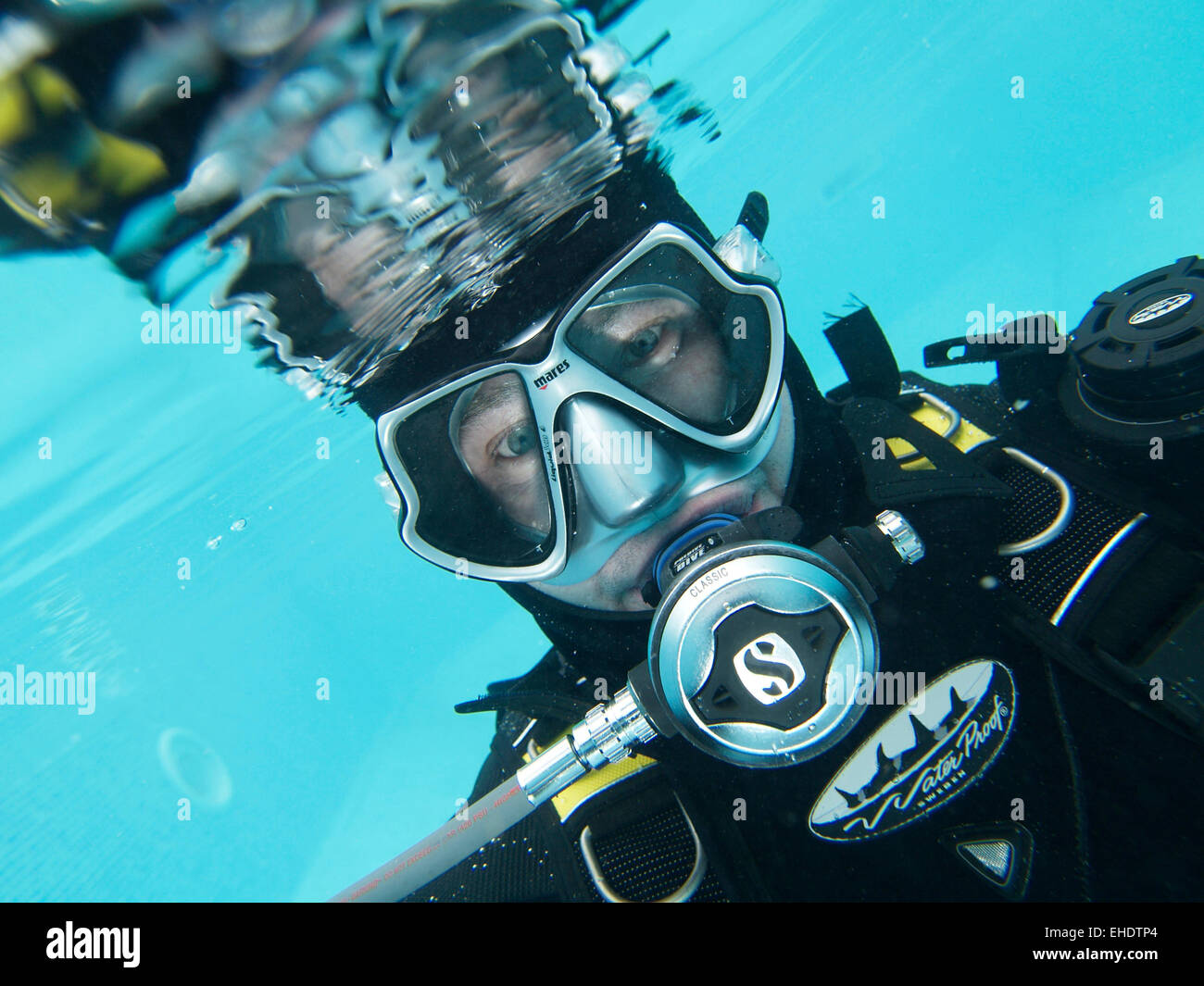 Diver In Shallow Water Stock Photo - Alamy