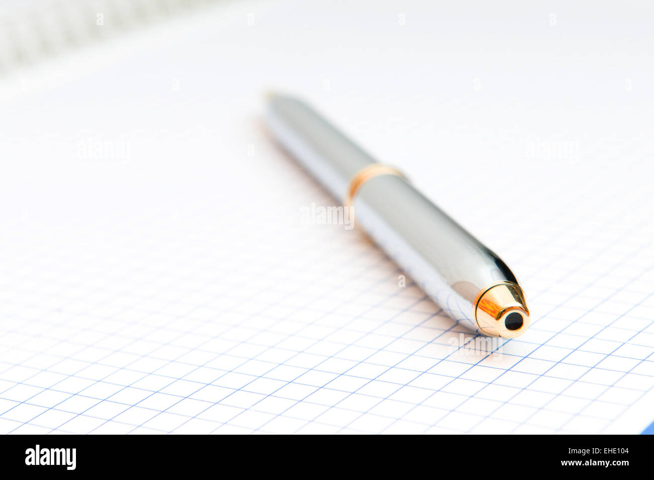 Writing pen on the blank page Stock Photo - Alamy