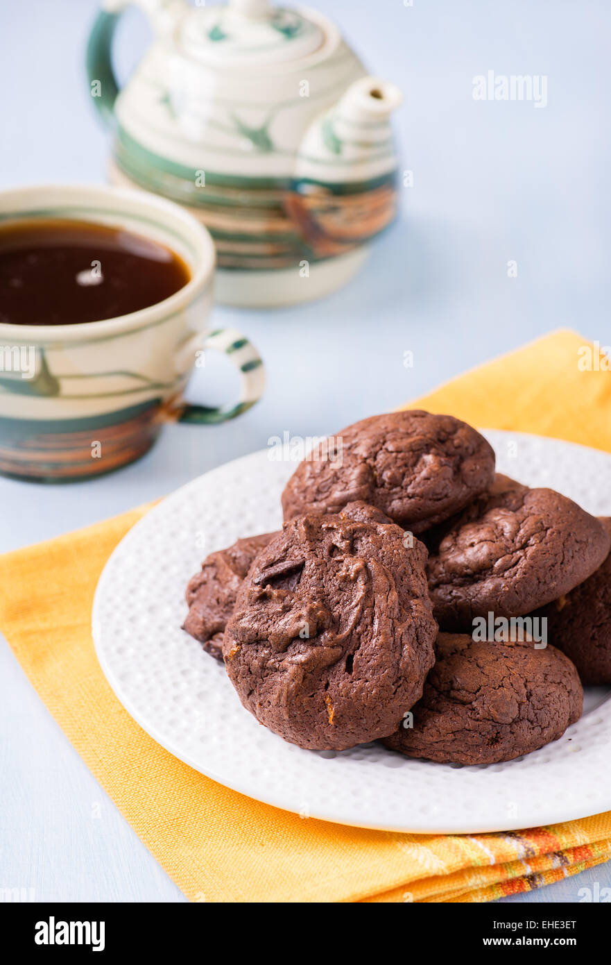 Homemade chocolate cookies on white plate, selective focus Stock Photo