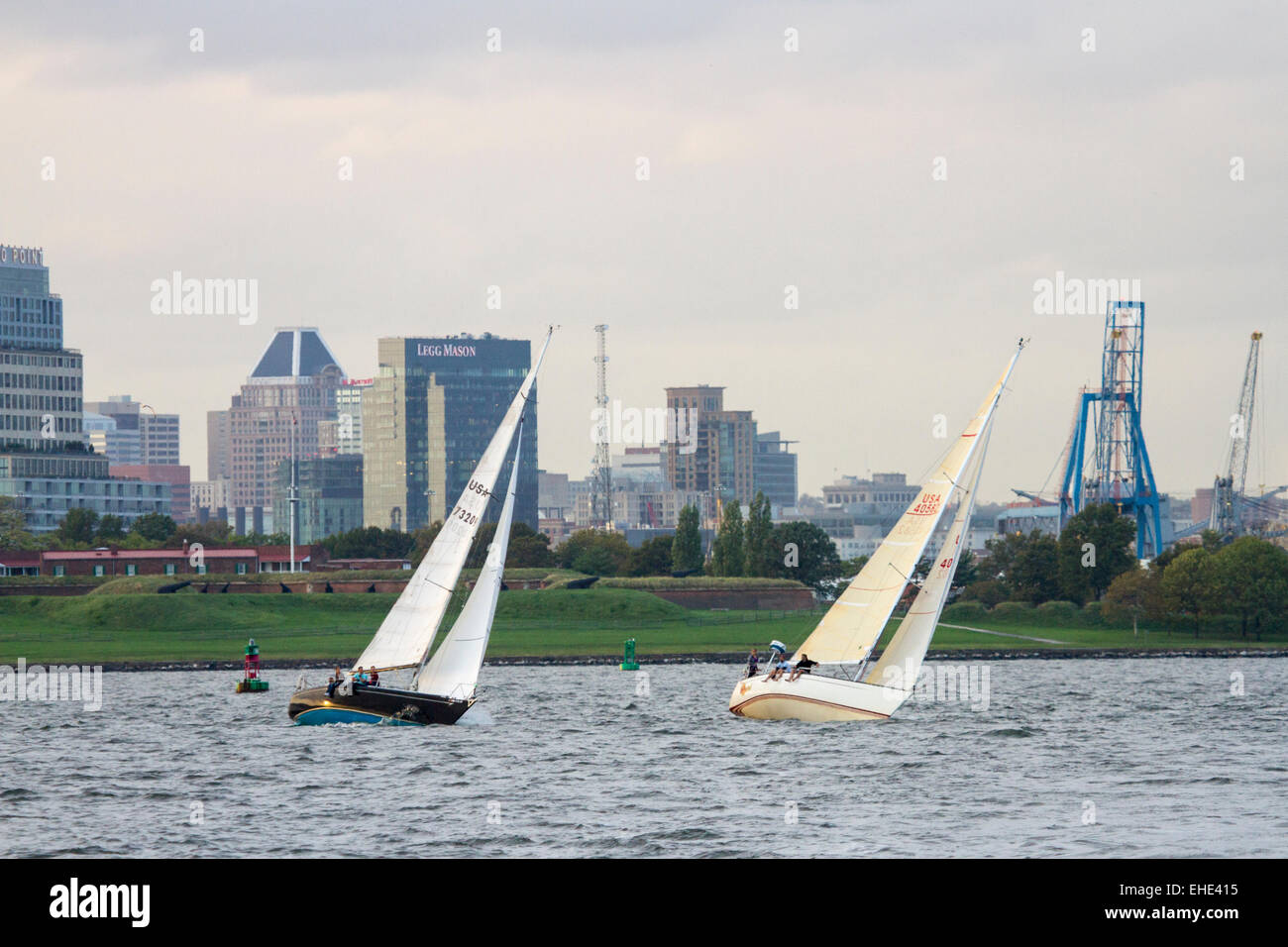 Sailboats on the Chesapeake Bay in front of Fort McHenry with Baltimore, Maryland in the background Stock Photo