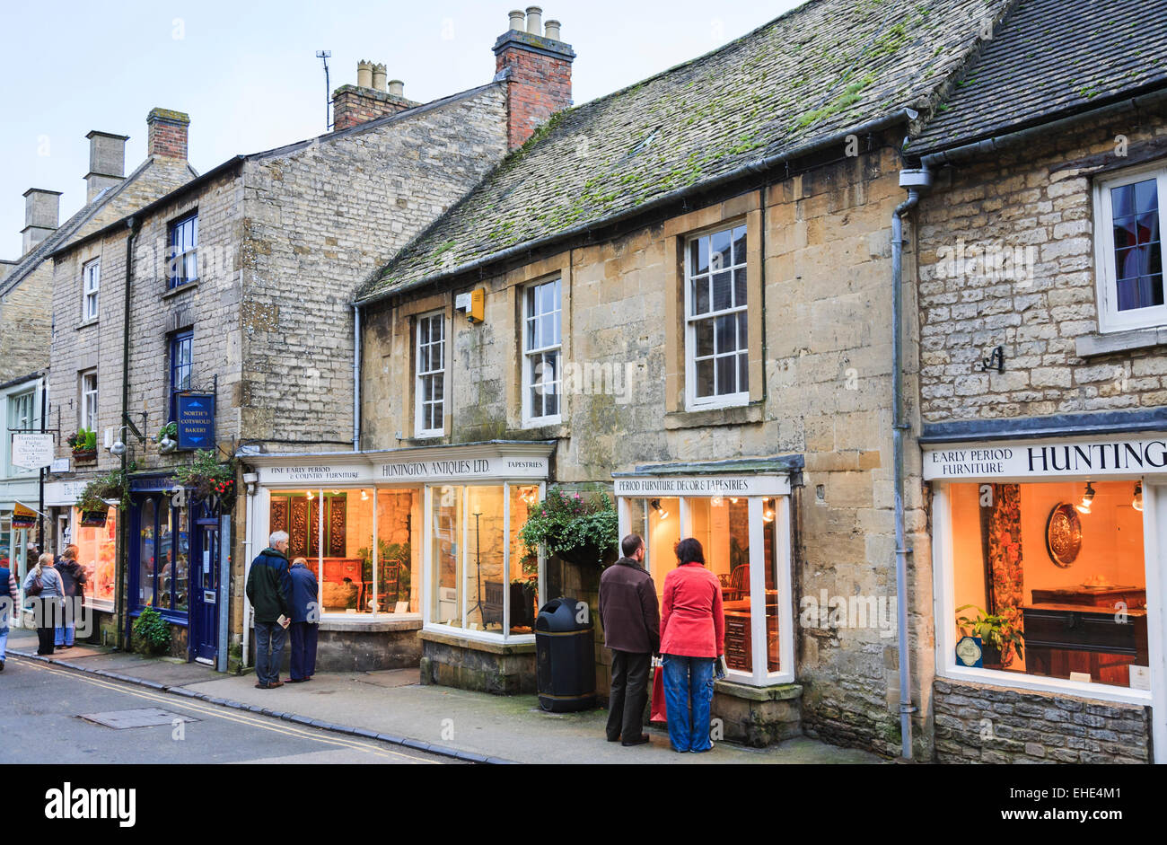 People window shopping in antiques shops, Stow on the Wold, Cotswolds