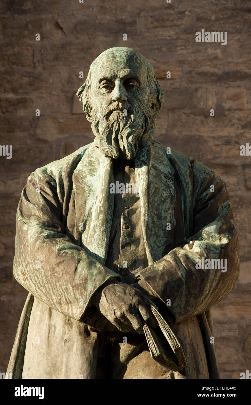 English literature. Evening sunshine falls on a statue of the poet William Barnes, known for his poetry in the Dorset dialect. Dorchester, England. UK Stock Photo