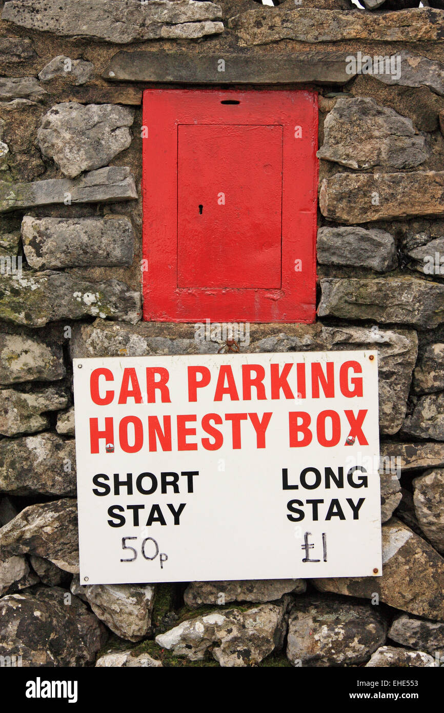 Car parking 'honesty box' set into a dry stone wall near one approach to Pen-y-Ghent / Yorks Dales NP / Yorkshire / UK Stock Photo