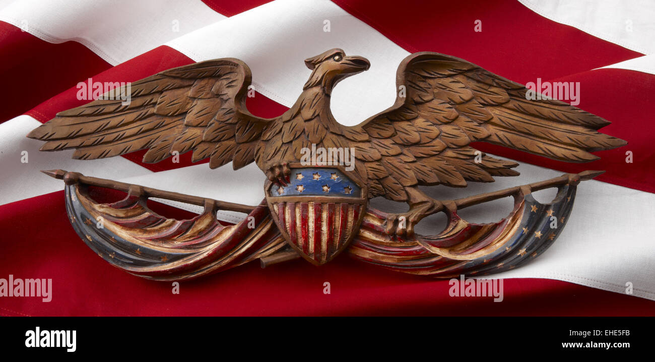 Carved American eagle on flag Stock Photo