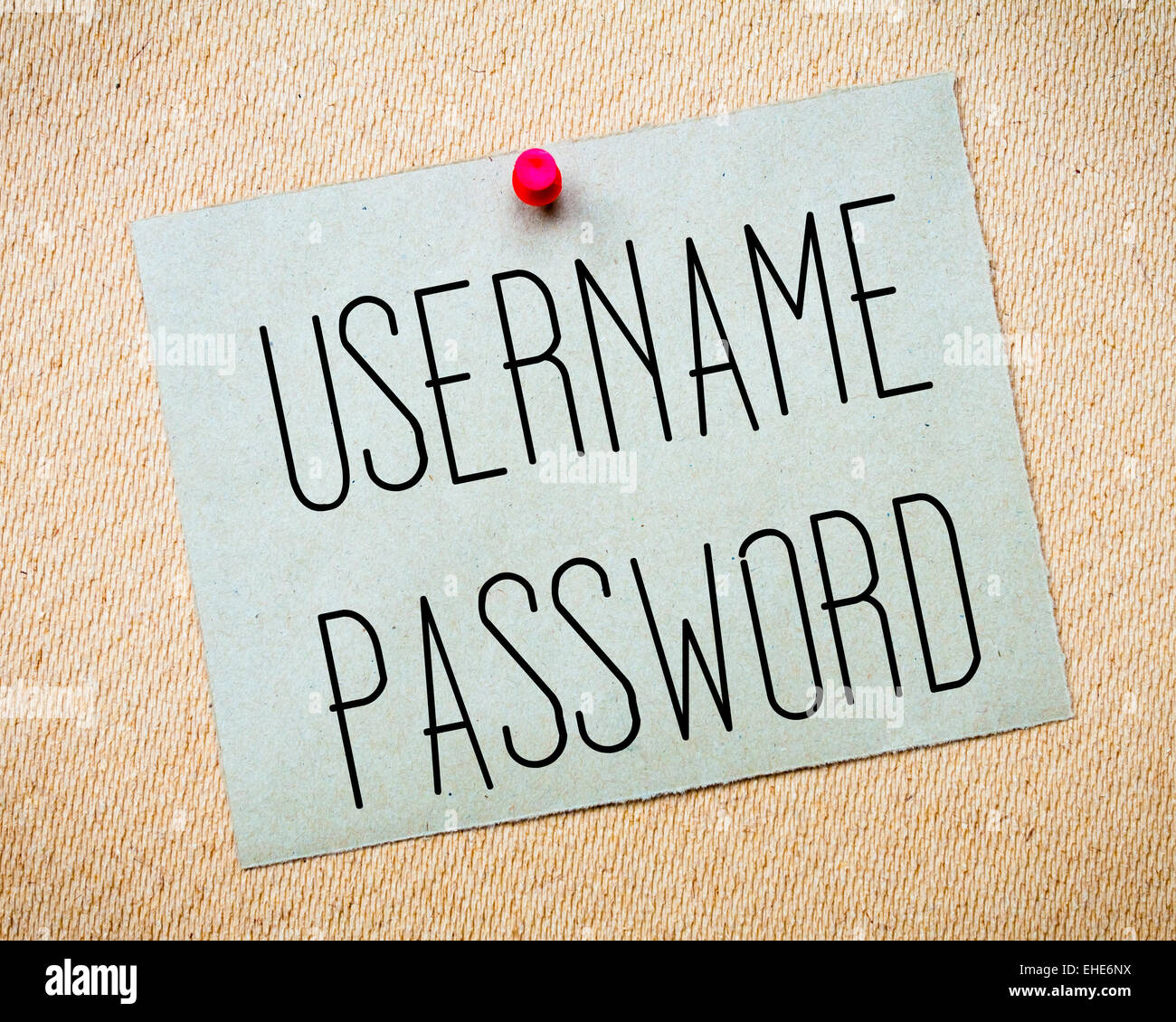 Recycled paper note pinned on cork board. Username and Password Message. Concept Image Stock Photo