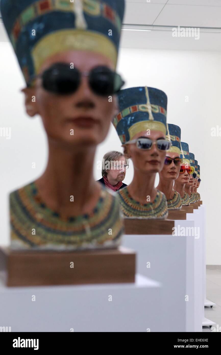 Frankfurt, Germany. 12th Mar, 2015. A visitor admires art works during the press view of the exhibition 'Isa Genzken. New Works' at the Museum for Modern Art in Frankfurt, Germany, on March 12, 2015. The exhibition will be held from March 14 to May 31. © Luo Huanhuan/Xinhua/Alamy Live News Stock Photo