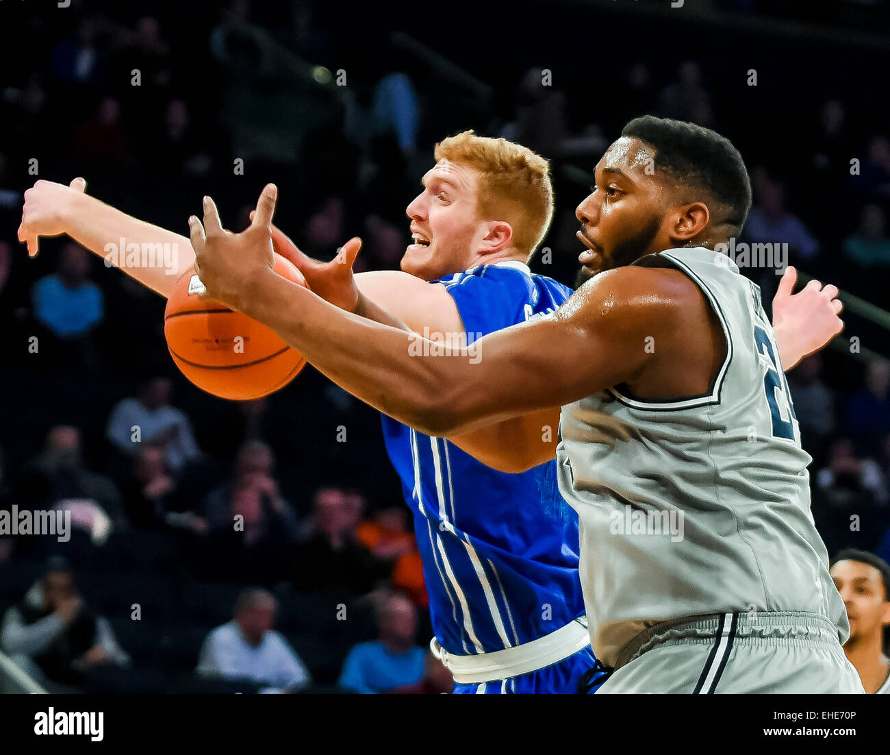 New York, NY, USA. 12th Mar, 2015. March 12, 2015: Creighton junior center Geoffrey Groselle (41) and Georgetown senior center Joshua Smith (24) fight for a rebound during the matchup between the Creighton Bluejays and the Georgetown Hoyas in the Big East Tournament at Madison Square Garden in New York, New York. Scott Serio/CSM/Alamy Live News Stock Photo