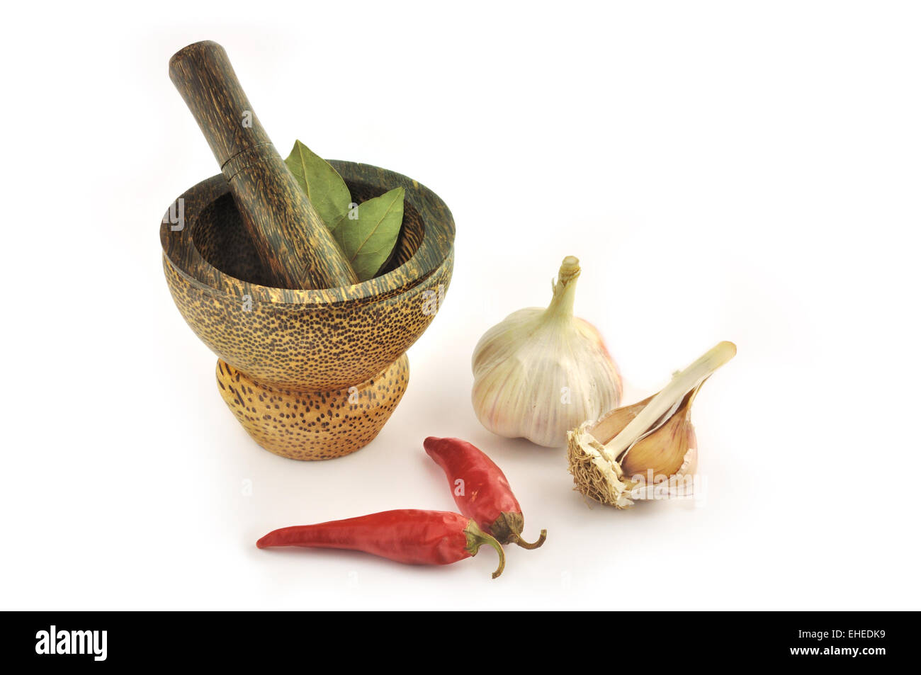 Garlic, chile pepper and mortal Stock Photo