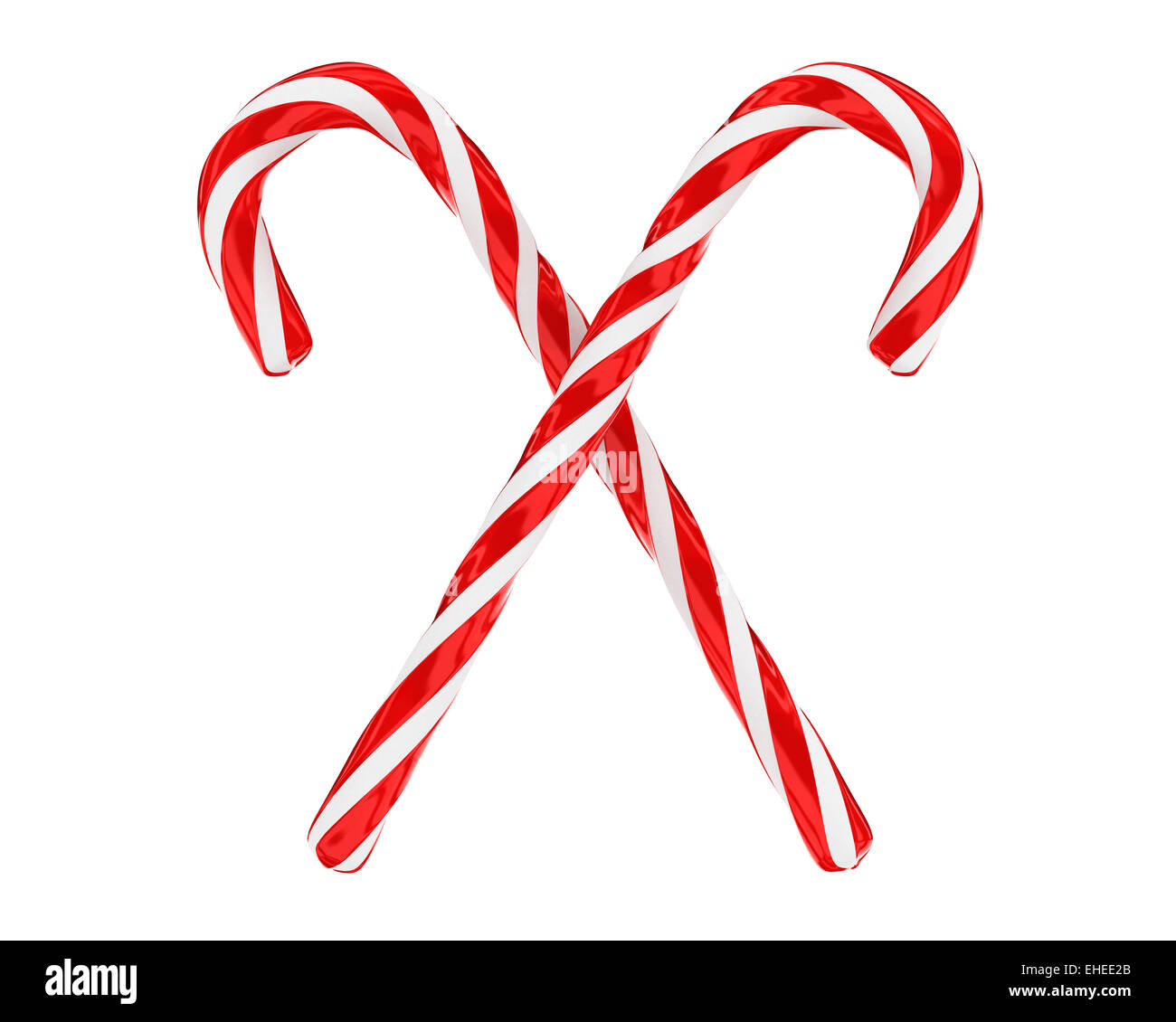 Two crossed christmas candies isolated Stock Photo - Alamy