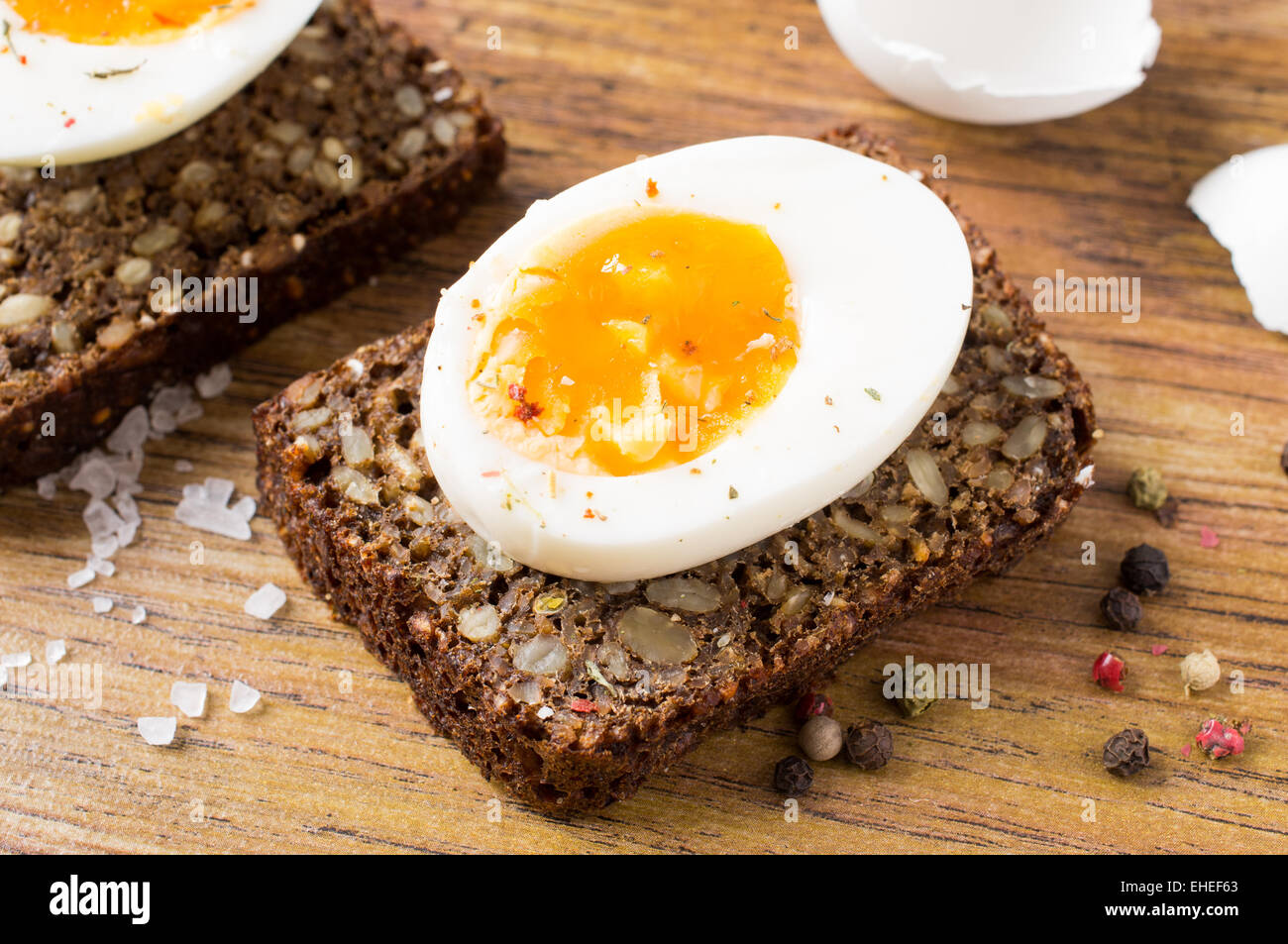 Hard boiled egg sandwich on a table Stock Photo - Alamy