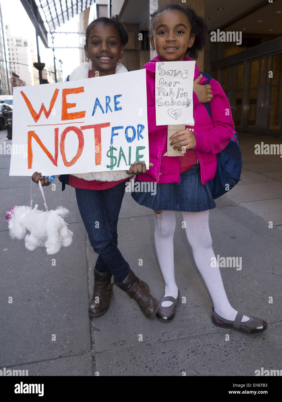 Sisters at Rally to Protect Public Education in NYC, March 11, 2015. Stock Photo