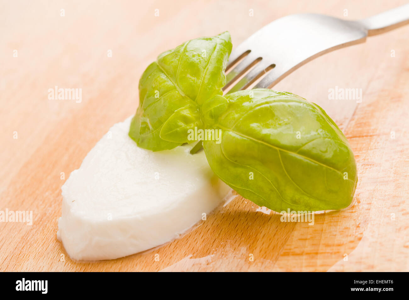Mozzarella with basil leaf Stock Photo Alamy