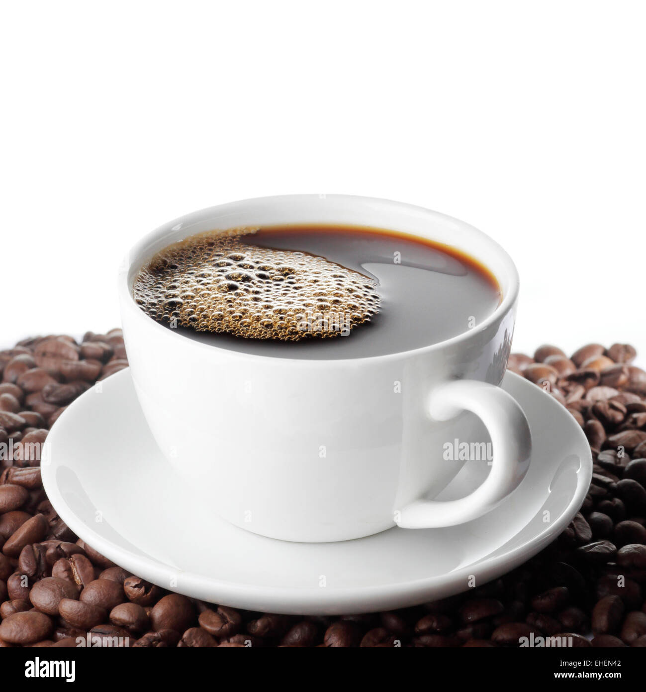 Coffee cup and beans isolated on white background Stock Photo - Alamy