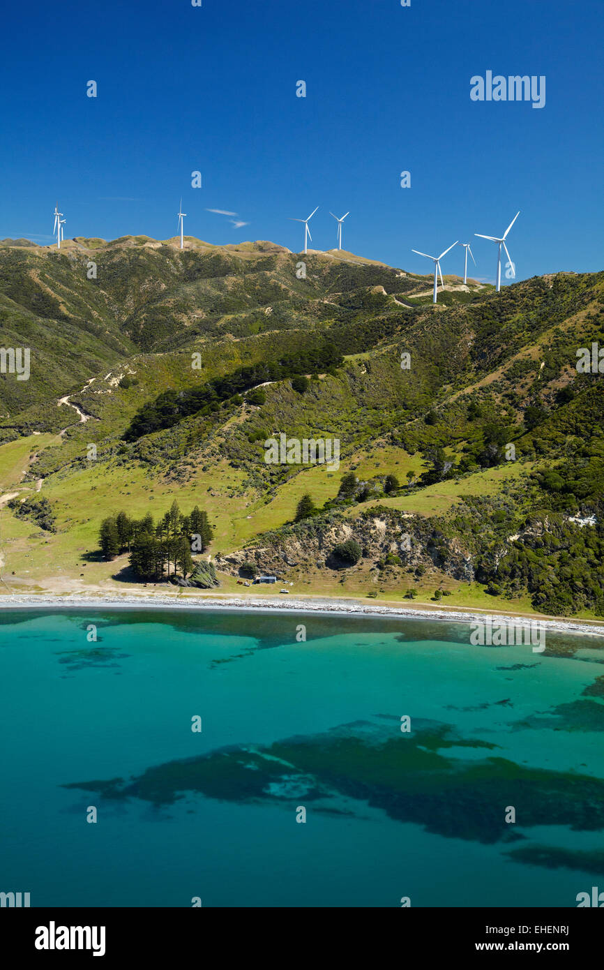 Te Ikaamaru Bay, and Makara Wind Farm (Project West Wind) Wellington, North Island, New Zealand - aerial Stock Photo